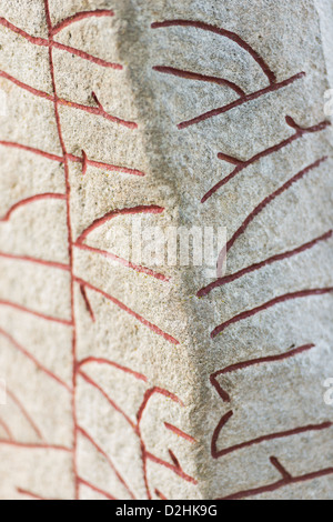 Details of runes on Scandinavian rune stone bearing interlace dragon ...