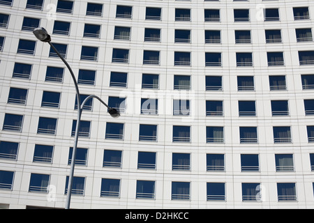 Street light set against Australia's largest hotel Four Points by Sheraton Darling Harbour Sydney Australia Stock Photo