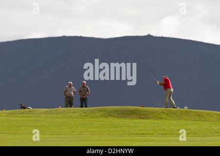 Men playing golf in Stromness, Orkney isles Stock Photo