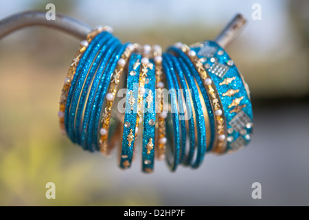 Brightly coloured blue bracelets for a Mendhi party, part of a Hindu wedding ceremony in India, Goa. Stock Photo