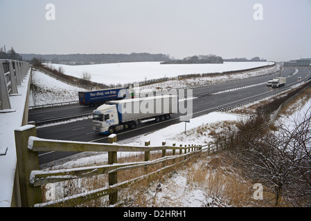 traffic on A1/M motorway in winter snow near leeds, yorkshire, united kingdom Stock Photo
