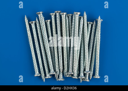 Pile of 100mm by 7.5mm concrete screws Stock Photo