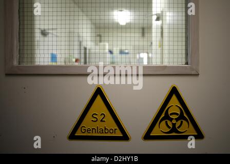 Lab Forbidden Sign Warning signs and prohibition signs hang on a door to a gene laboratory ...
