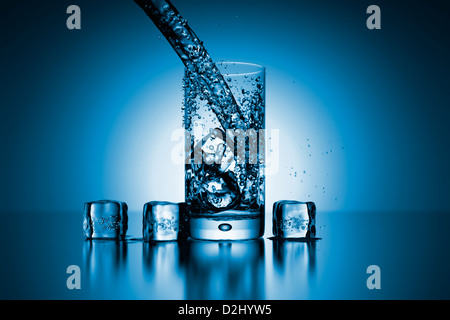 An image of a backlit glass of water Stock Photo