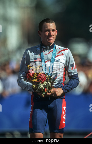 Lance Armstrong with his bronze medal for the individual time trial at the 2000 Olympic Summer Games. Stock Photo