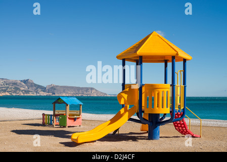 A colorful chute on a sunny Mediterranean beach Stock Photo