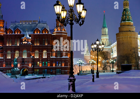snow in Moscow - Kremlin towers in winter snowing evening Stock Photo