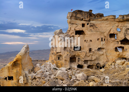 Cave dwelling in the abandoned ancient hilltop village of Cavusin in Cappadocia Turkey Stock Photo