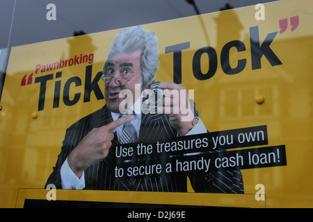 GV of an advert in a pawnbrokers shop window in London Road, Brighton, East Sussex, UK. Stock Photo