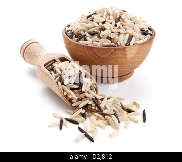 wild brown rice in a wooden bowl isolated on white background Stock Photo