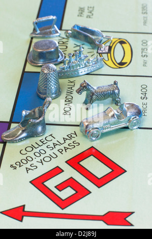 Monopoly board game with token pieces Stock Photo