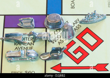 Monopoly board game with token pieces Stock Photo