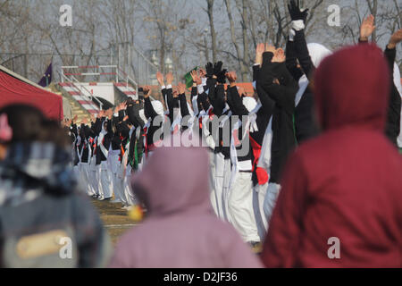 Srinagar, India. 26th January 2013.  Kashmiri muslim school girl dressed in traditional outfits sing during India's 64th Republic Day celebrations in Srinagar, the summer capital of Indian Kashmir,on 26/1/2013mobile phone services were suspended across the Kashmir Valley as part of a security drill. Different service providers did not issue any alert to subscribers before suspending their services.complete shutdown was observed across Muslim majority areas of the region in response to the call given by regionâ€™s separatist groups .Photo/Altaf Zargar/Zuam press (Credit Image: © Altaf Zargar/ZU Stock Photo