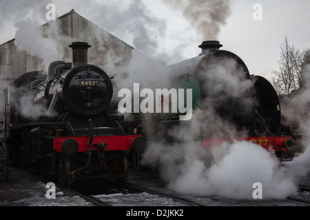 Steam locomotives Ivatt class number46521 and King Arthur class Sir Lamiel number 30777 Stock Photo