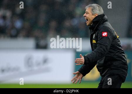 Gladbach's head coach Lucien Favre gestures at the sidelines during the Bundesliga soccer match between Borussia Moenchengladbach and Fortuna Duesseldorf at Borussia Park in Moenchengladbach, Germany, 26 January 2013. Photo: MARIUS BECKER (ATTENTION: EMBARGO CONDITIONS! The DFL permits the further  utilisation of up to 15 pictures only (no sequntial pictures or video-similar series of pictures allowed) via the internet and online media during the match (including halftime), taken from inside the stadium and/or prior to the start of the match. The DFL permits the unrestricted transmission of di Stock Photo