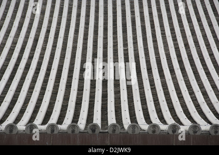 Detail of a japanese roof with traditional roofing tiles Stock Photo