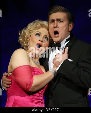 Laura Parfitt as Marilyn Monroe and Garrie Davislim as J.F. Kennedy rehearse the opera 'Happy Birthday, Mr. President' by Kriss Russmann (music) and Syllaynn Kleibel (text) at Volkstheater Rostock in Rostock, Germany, 25 January 2013. The opera will be performed for the first time on 27 January 2013. The plot is for the most part fictitious and will take a look at the life of US diva Marilyn Monroe (1926-1962). Photo: BERND WUESTNECK Stock Photo