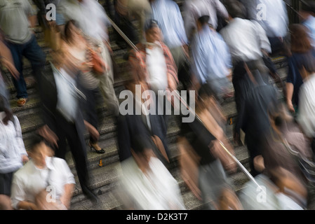Workers commuting to work at the busy Shinagawa Station in Tokyo Japan Stock Photo