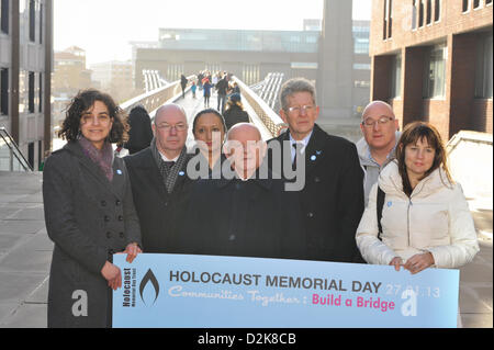 Millenium Bridge, London, UK. 27th January 2013. Ben Helfgott [centre] with other members of the  event for Holocaust Memorial Day, with the theme of 'Build a Bridge'. Holocaust Memorial Day commemoration takes place at the Millennium Bridge. A choir and survivors of the Holocaust took part in the ceremony. Credit: Matthew Chattle/Alamy Live News Stock Photo