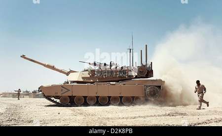 A US Marine Corps M1A1 Abrams tank finishes refueling at Combat Outpost Shir Ghazi, Helmand province, Afghanistan, July 27. Stock Photo