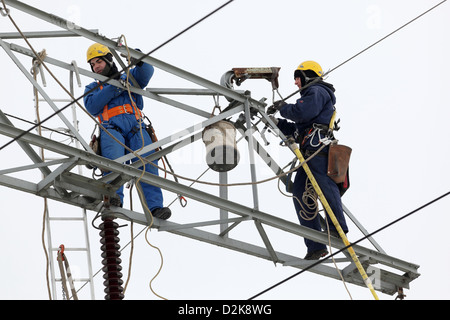 Zepernick, Germany, engineers are working on a pylon Stock Photo
