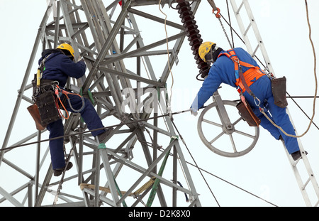 Zepernick, Germany, engineers are working on a pylon Stock Photo