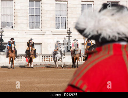London, UK. 27th Jan, 2013.  Civil war recreators look on as horses line up in Horse Guard's Parade for a service to commemorate the 'martyrdom' of King Charles I. Credit: Andy Thornley/Alamy Live News Stock Photo
