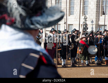 London, UK. 27th Jan, 2013.  Civil war recreators look on as royalist troops line up in Horse Guard's Parade for a service to commemorate the 'martyrdom' of King Charles I. Credit: Andy Thornley/Alamy Live News Stock Photo