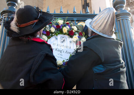 London, UK. 27th Jan, 2013.  English Civil War recreators attach a wreath to Banquetting House on Whitehall at the spot where King Charles I was executed. Credit: Andy Thornley/Alamy Live News Stock Photo