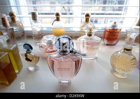Perfume Bottles On A Window Sill Stock Photo