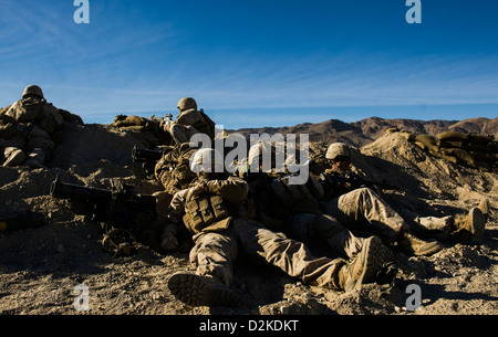 U.S. Marine Corps 3rd Battalion 4th Marine Regiment infantry rest while participating in Integrated Training Exercise (ITX) 13-1 at Twentynine Palms Marine Corps Base, California 22 Jan, 2013. The ITX is the training exercise that Marines come to prior to Stock Photo