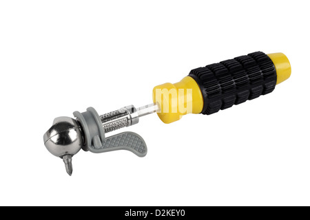 Yellow metalwork key separately on a white background Stock Photo