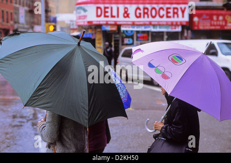 Umbrellas on a rainy day in Chinatown, Manhattan, New York, NY, USA. Stock Photo
