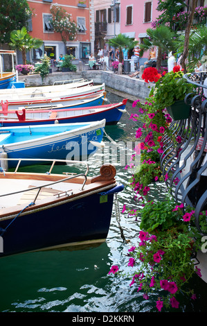 Small wooden boats in Limone harbour, Lake Garda Italy Stock Photo