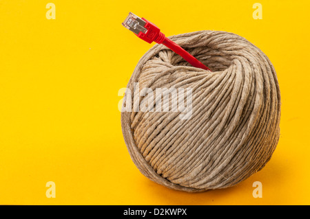 A roll of twine and ethernet cable Stock Photo