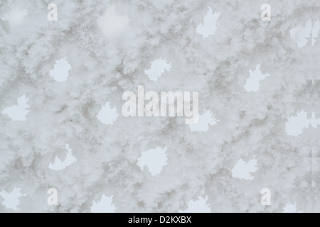 Snow piled on the wires of a chain link fence for background Stock Photo