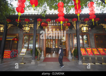 Man outside Panxi restaurant, Guangzhou, Guangdong, China Stock Photo