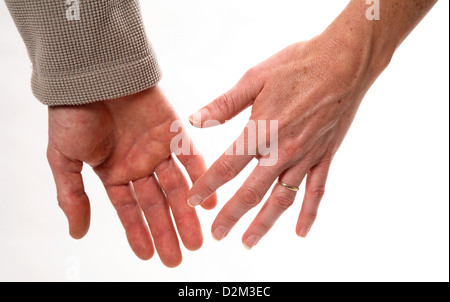 Mature couple hands parting. Stock Photo