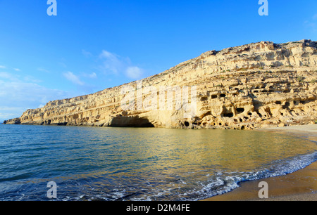 The cliffs at Matala beach, on the south coast of Crete, Greece, Stock Photo