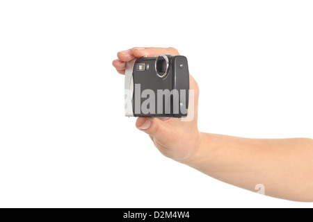 Beautiful woman hands holding a compact camera in a white isolated background Stock Photo