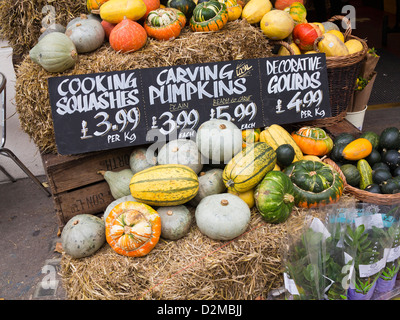 Pumpkins on a stall, UK Stock Photo