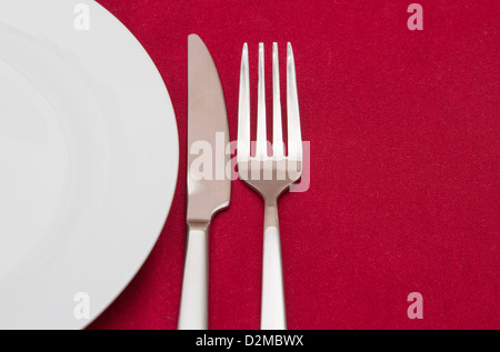 Place setting with white round plate Stock Photo