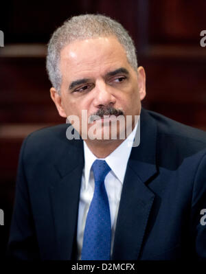 United States Attorney General Eric Holder listens as U.S. President Barack Obama and Vice President Joe Biden meet with representatives from the Major Cities Chiefs Association and Major Counties Sheriffs Association to discuss the Administration's plans to reduce gun violence in America..Credit: Ron Sachs / Pool via CNP Stock Photo