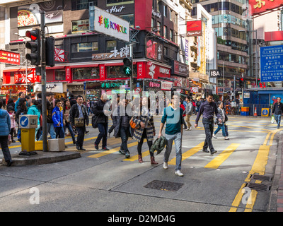 Street scene in Hong Kong - in the Causeway Bay area crowded with people on the streets Stock Photo