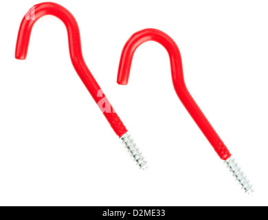 Two red plastic coated screw type storage hooks Stock Photo