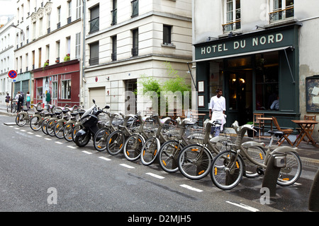 A chef stands outside the Hotel du Nord in Paris, France Stock Photo