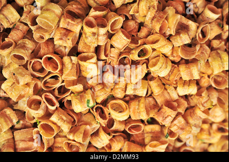 fried Banana roll, made from dehydrated slices of fresh ripe banana, background Stock Photo