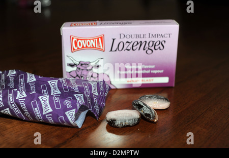 Covonia menthol berry flavoured lozenges to help with a cough and sore throat Stock Photo