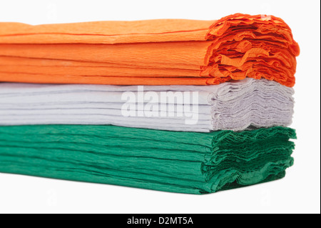 Close-up of a stack of colorful papers representing Indian flag colors Stock Photo