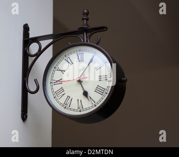 Close-up of a clock on the wall Stock Photo